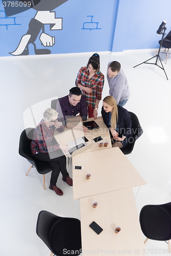 Image of aerial view of business people group on meeting