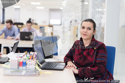 Image of startup business, woman  working on laptop