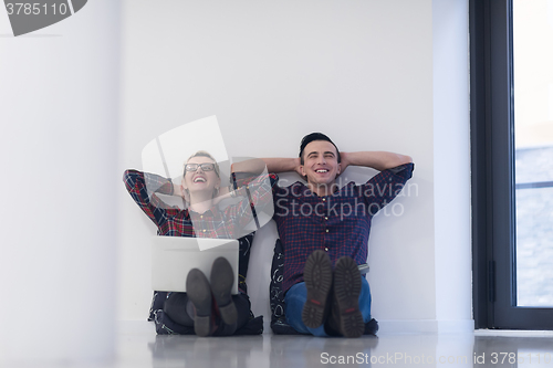 Image of startup business, couple working on laptop computer at office