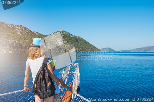 Image of mother and son on yacht