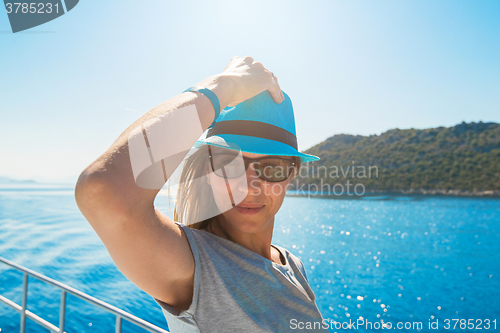 Image of woman on yacht