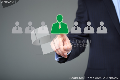 Image of businessman choosing right partner from many candidates