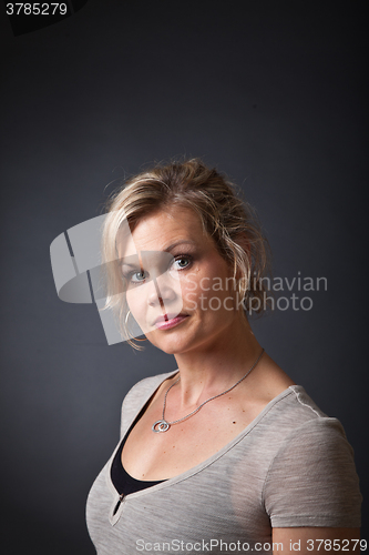 Image of Cute blond girl shot in studio