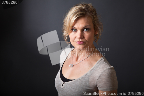 Image of Cute blond girl shot in studio