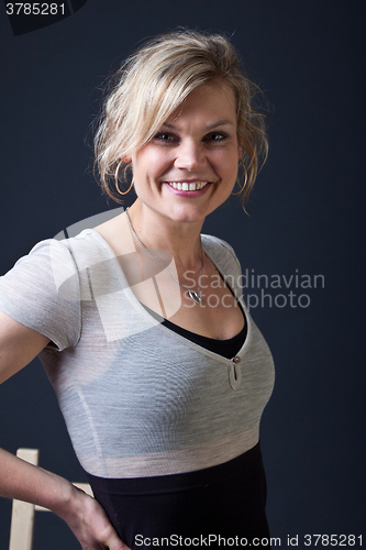 Image of Cute blond girl shot in studio