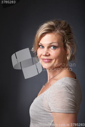 Image of Cute blond girl shot in studio