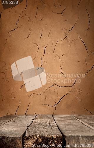 Image of Clay wall and table