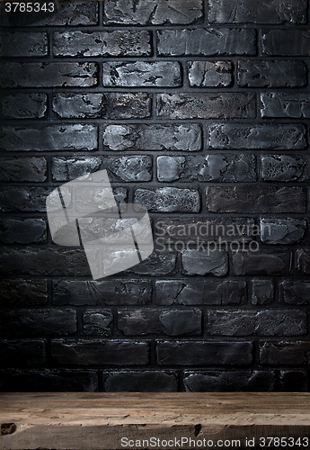 Image of Brick wall and table