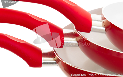 Image of Set of three frying pans, red