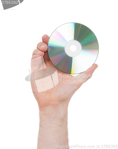 Image of Man hand with compact disc isolated