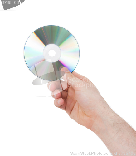 Image of Man hand with compact disc isolated