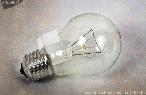 Image of Old lightbulb isolated on a white background