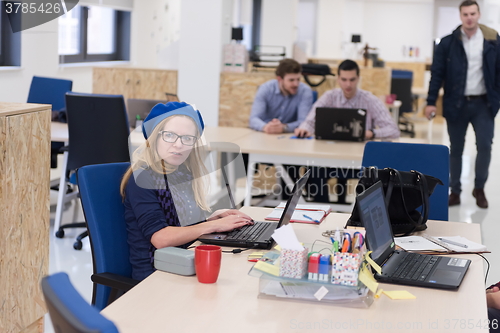 Image of startup business, woman  working on laptop