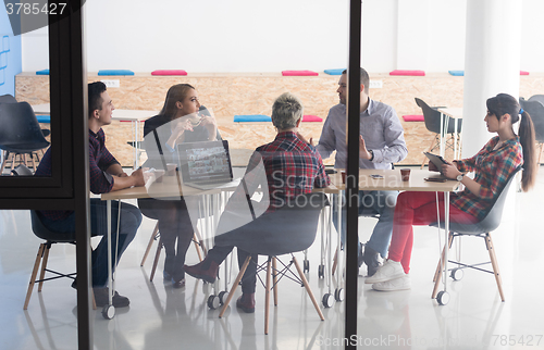 Image of startup business team on meeting at modern office