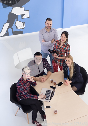 Image of aerial view of business people group on meeting