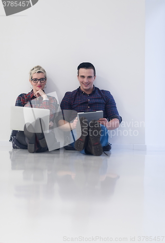 Image of startup business, couple working on laptop computer at office