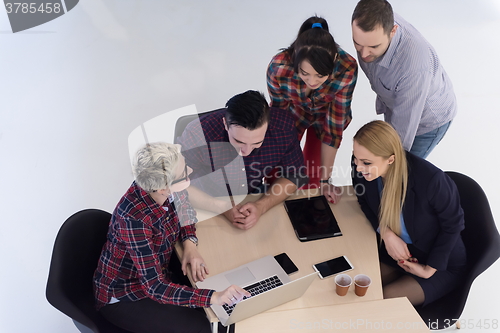 Image of aerial view of business people group on meeting