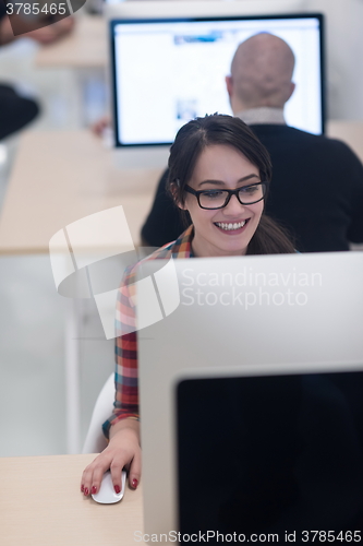 Image of startup business, woman  working on desktop computer