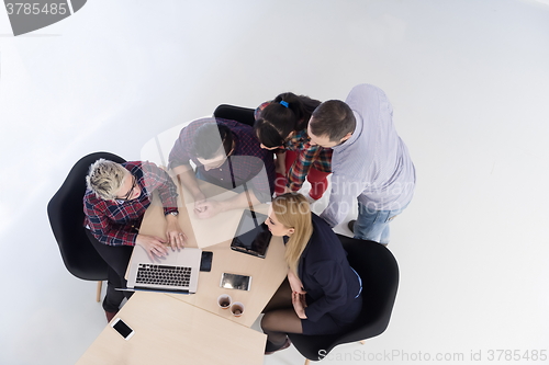 Image of aerial view of business people group on meeting