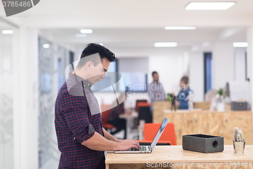 Image of startup business, young  man portrait at modern office