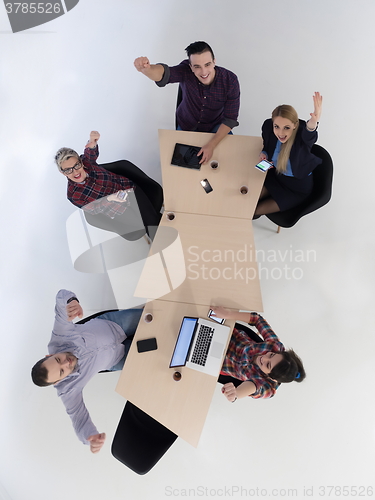 Image of aerial view of business people group on meeting