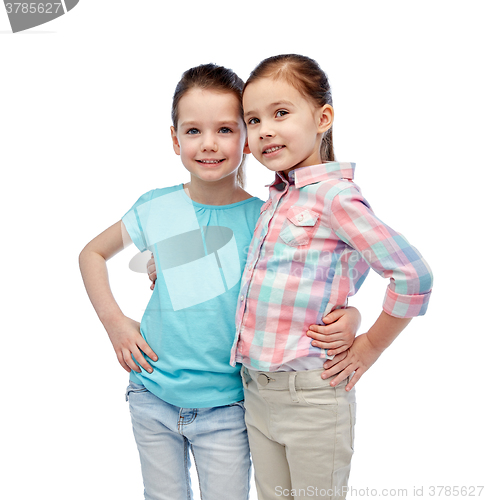 Image of happy smiling little girls hugging