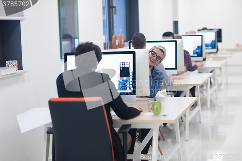 Image of startup business, woman  working on desktop computer