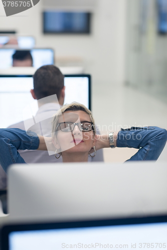 Image of startup business, woman  working on desktop computer