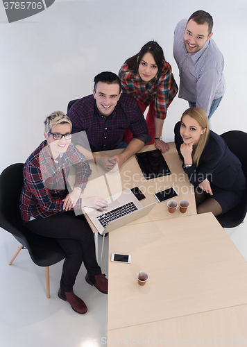 Image of aerial view of business people group on meeting