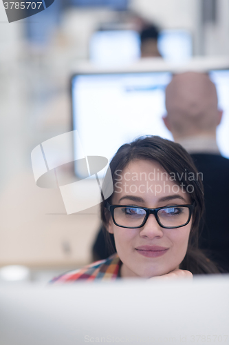 Image of startup business, woman  working on desktop computer