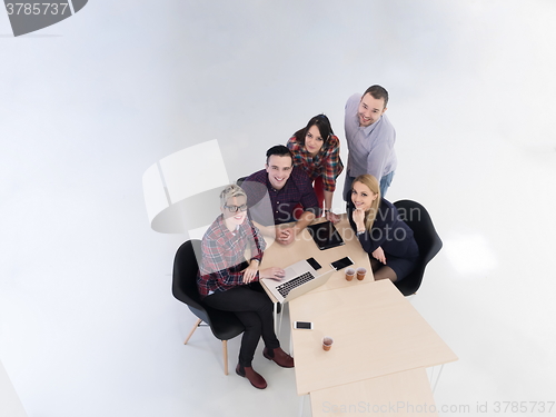 Image of aerial view of business people group on meeting