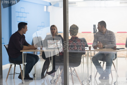 Image of startup business team on meeting at modern office