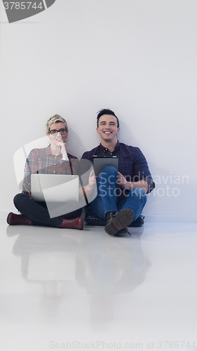 Image of startup business, couple working on laptop computer at office