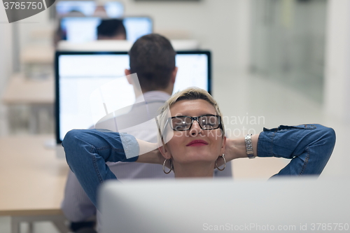 Image of startup business, woman  working on desktop computer