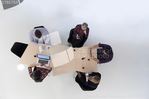 Image of aerial view of business people group on meeting