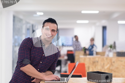 Image of startup business, young  man portrait at modern office