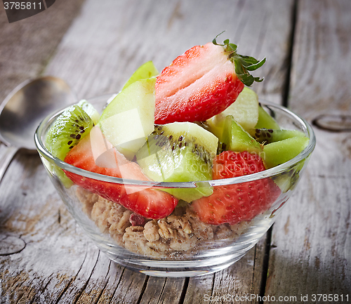 Image of granola with berries in a bowl