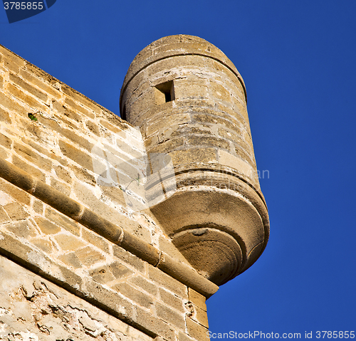 Image of  brick in old construction  africa morocco and   the tower near 