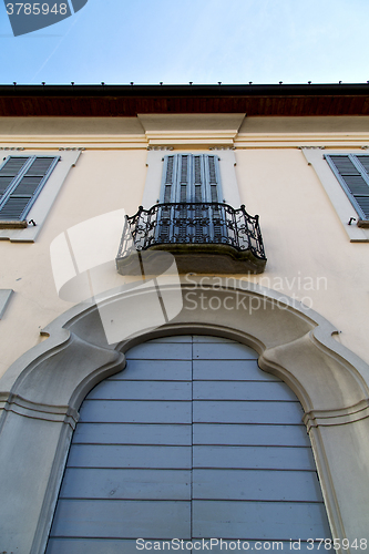 Image of brown door  europe  italy        in  the milano    window closed