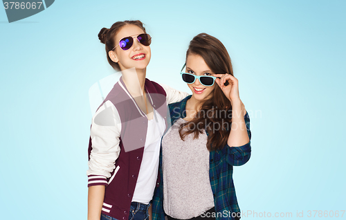 Image of happy smiling pretty teenage girls in sunglasses