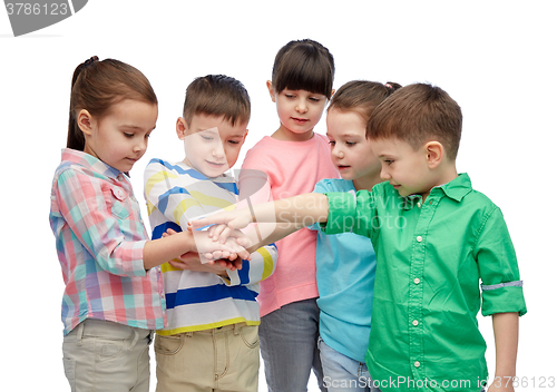 Image of happy little children with hands on top