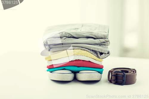 Image of close up of clothes and accessories on table