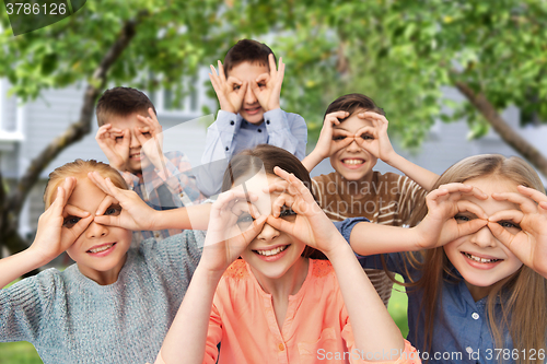 Image of happy children making faces and having fun