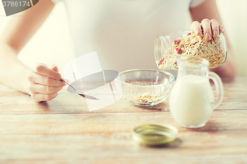 Image of close up of woman eating muesli for breakfast