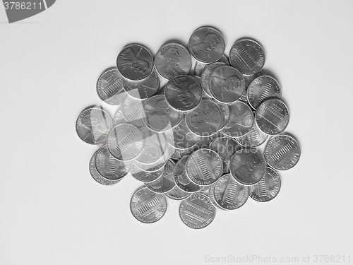 Image of Black and white Dollar coins 1 cent