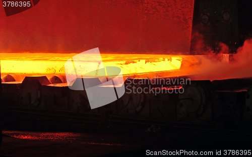 Image of hot steel on conveyor