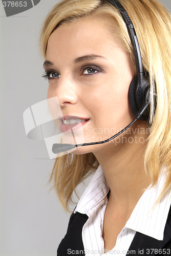 Image of woman with headset