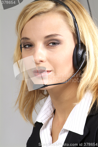 Image of woman with headset