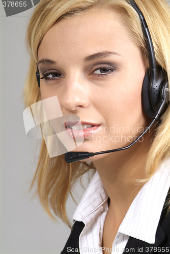 Image of woman with headset