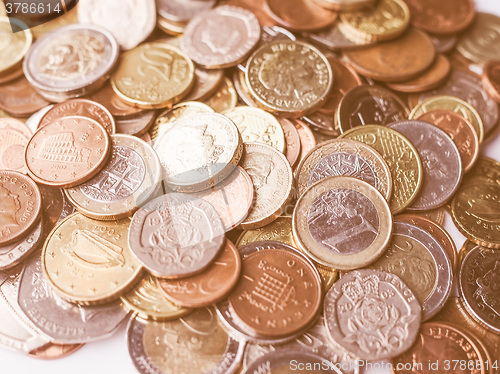 Image of  Euro and Pounds coins vintage